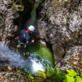 Jumping into cave like pool in Fratarica canyon