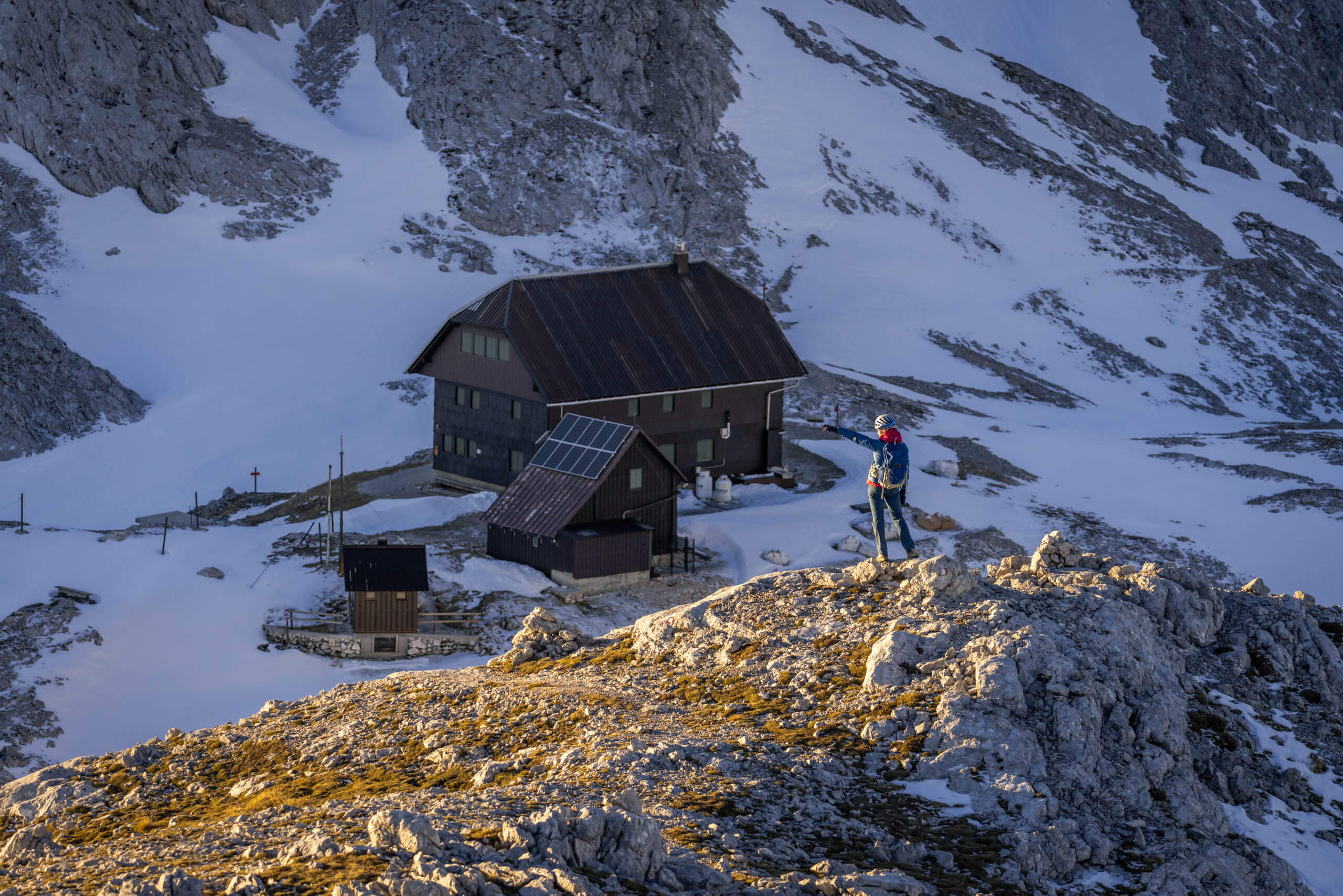 Hiker next to Stanič hut in Autumn Time, Slovenia