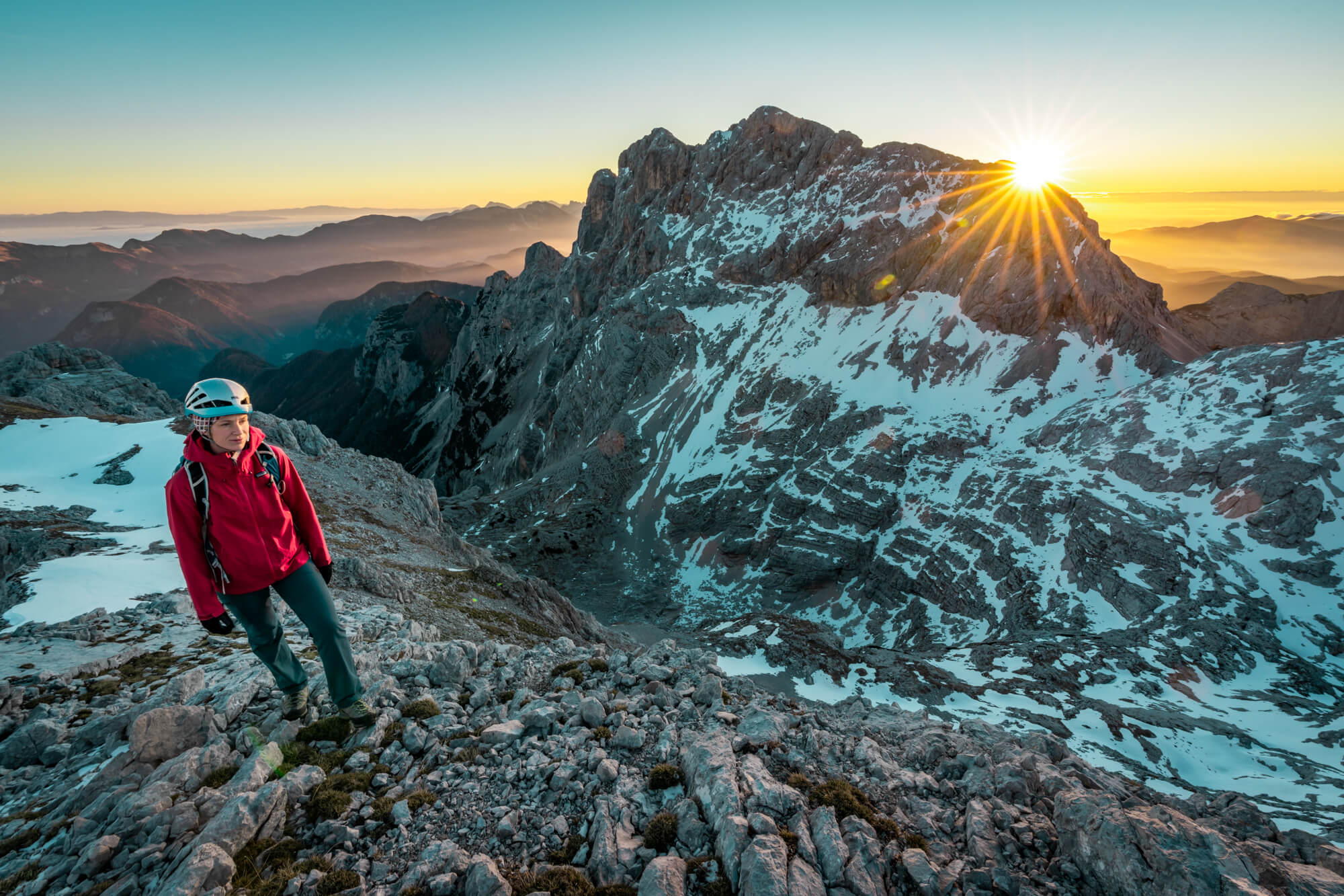 Female Hiker above Kot Valley, Gorgeous Sunrise on the Background Female Hiker above Kot Valley, Gorgeous Sunrise on the Background