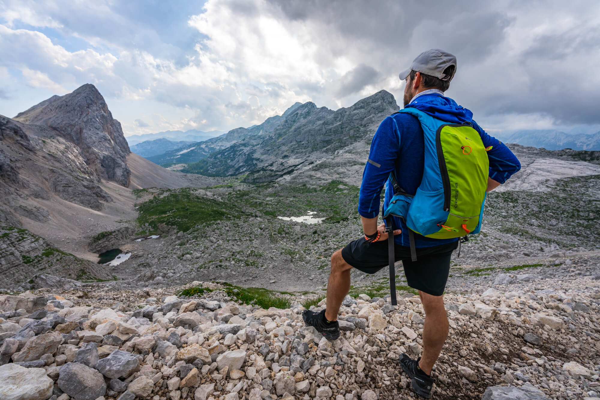 Hiker above Triglav Seven Lakes Valley Hiker above Triglav Seven Lakes Valley