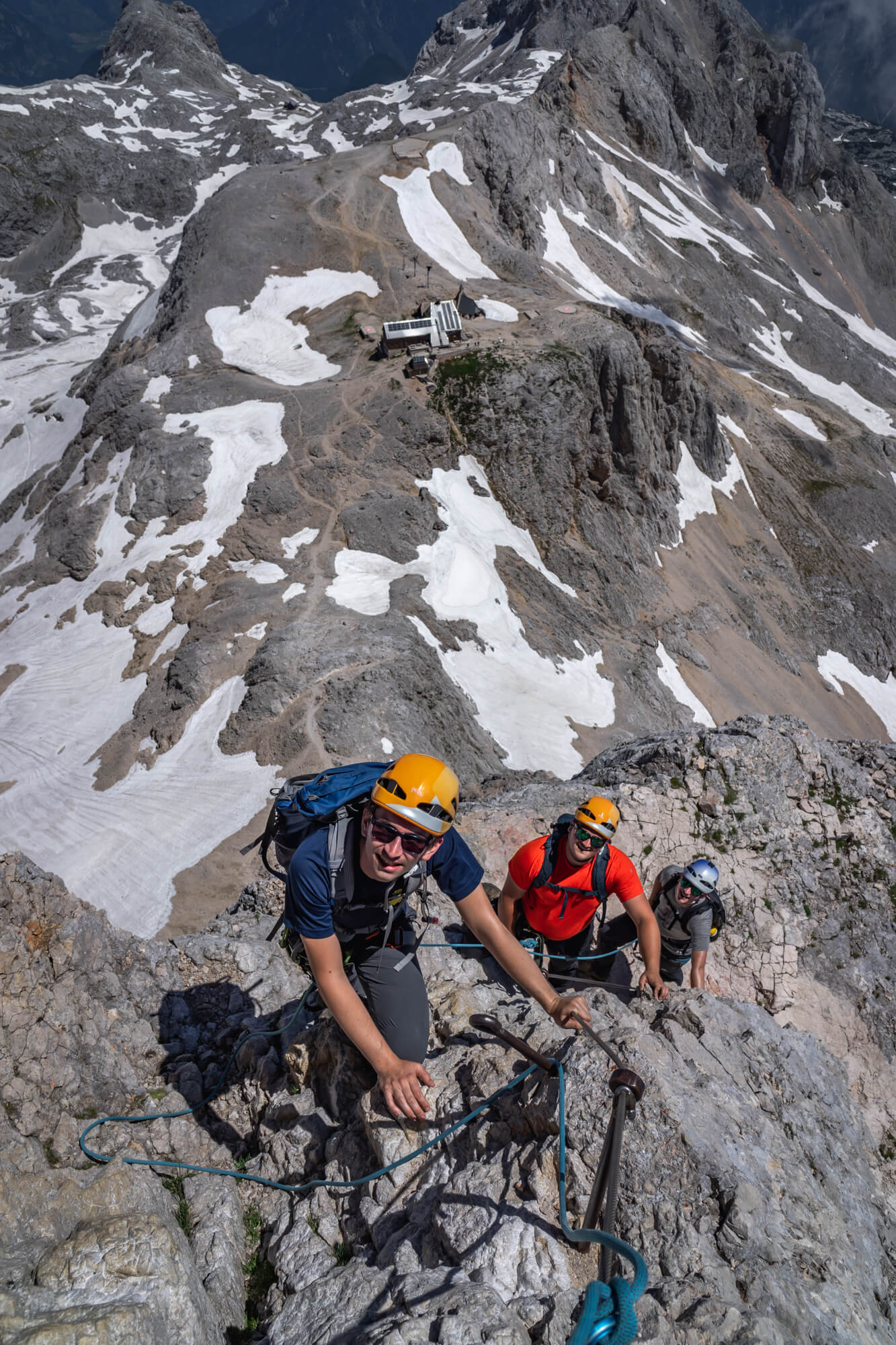 Male Mountaineers Climbing Towards Triglav Mountain