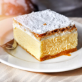 Close up picture of Kremšnita on the white plate