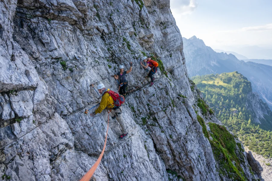 Via Ferrata Via Ferrata Slovenia: Three people climbing via ferrata in Triglav National Park.