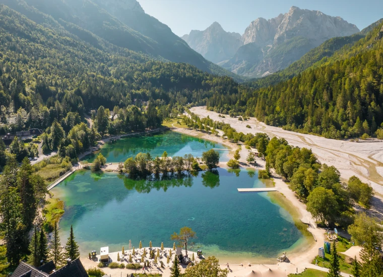 Aerial view of the two connected lakes of Lake Jasna formed by the Pišnica River near Kranjska Gora.