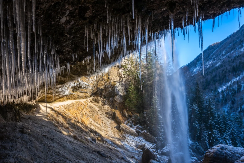 Icy Peričnik Waterfall viewed from behind in winter